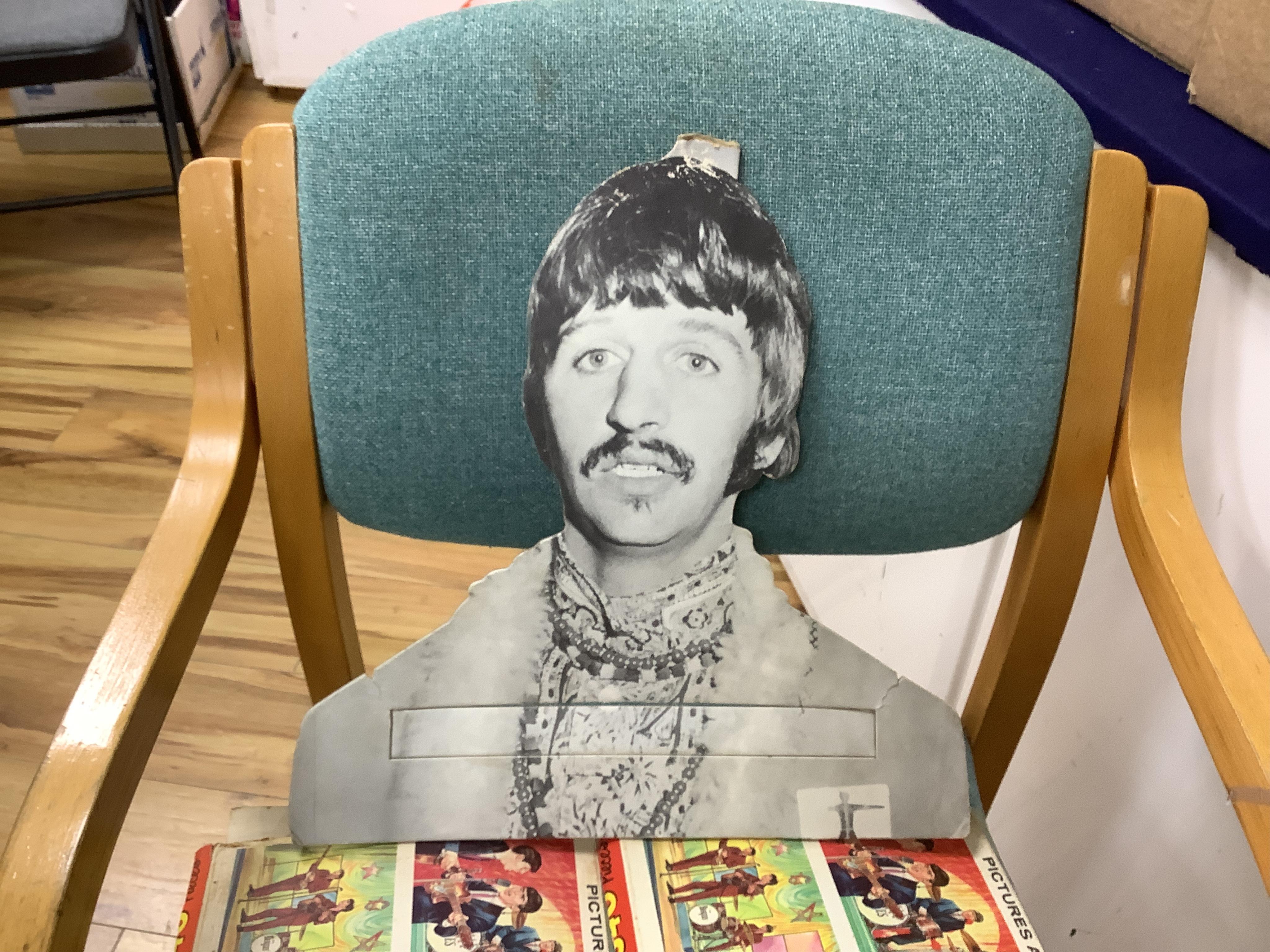 A 1960's Beatles child's plastic drum set in the original card box comprising of a snare drum on a stand, a card cut out bust of Ringo Starr, two 1960s Beatles jigsaws (unchecked) and a Beatles inflatable ball